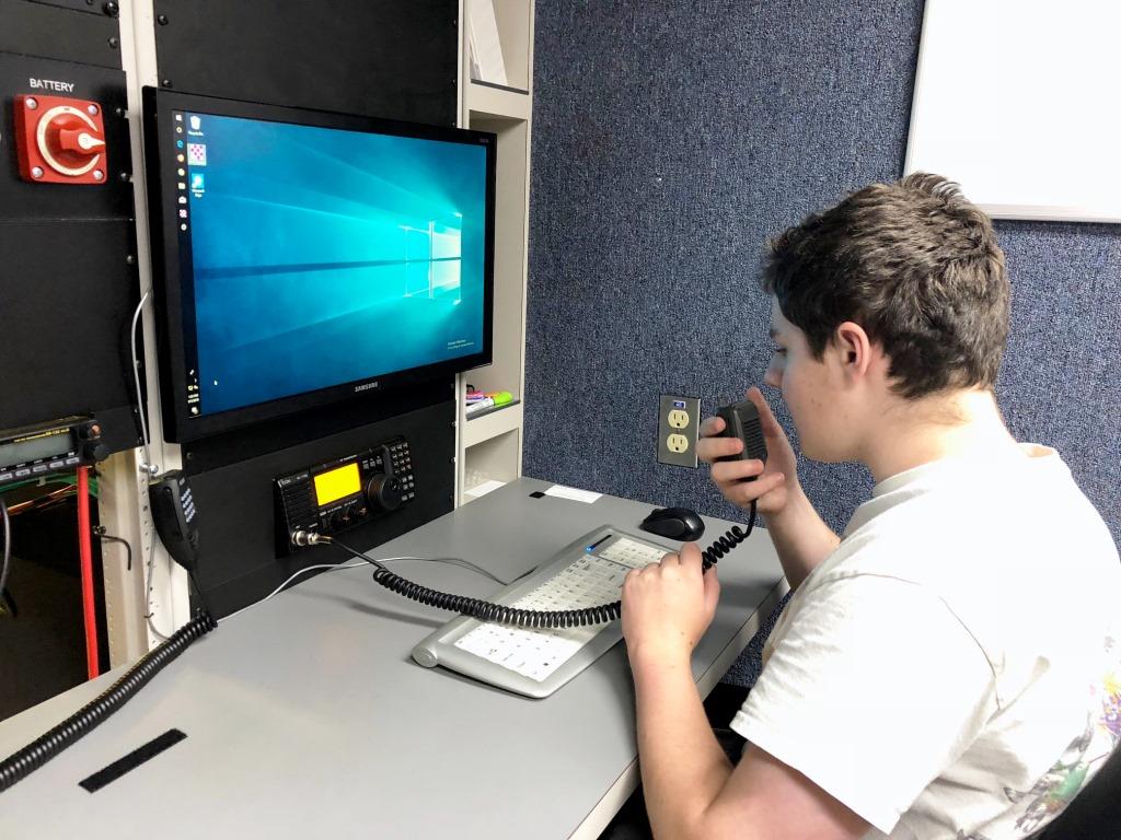 Isaac, AC3CJ, operating the HF rig.